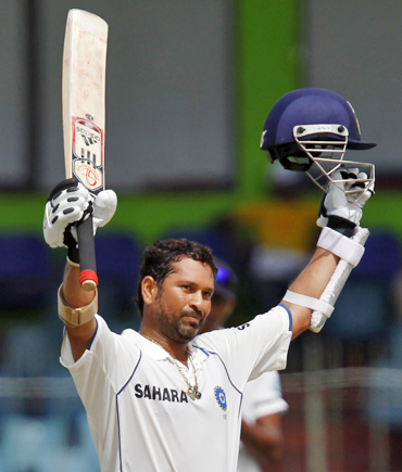 Tendulkar takes the left window seat of the front row in team bus