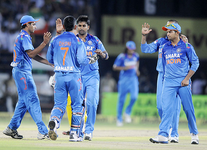India players celebrate after a dismissal