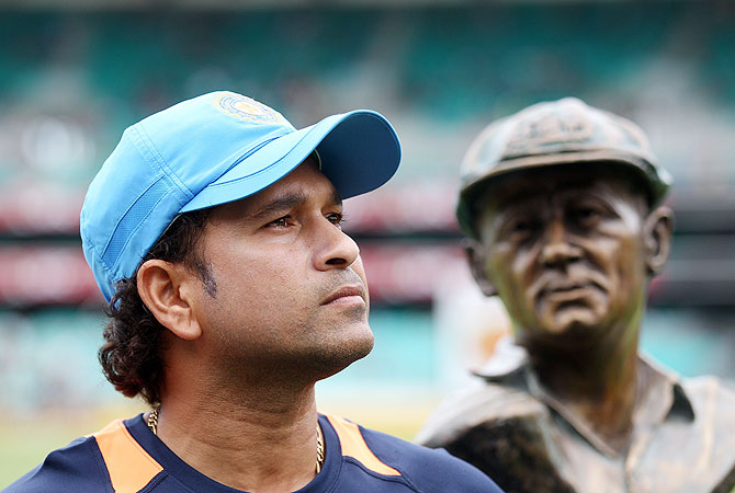Sachin Tendulkar of India looks on with a bust of Sir Donald Bradman in the background