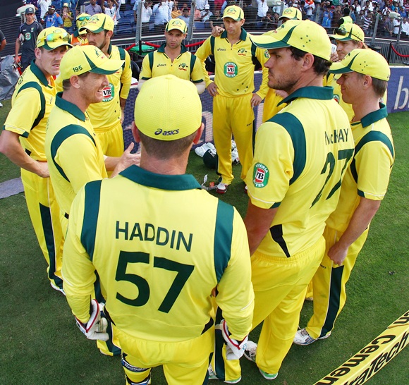 Australia captain George Bailey gives a pep talk to his players