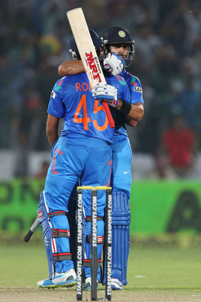 Rohit Sharma and Virat Kohli celebrate the win