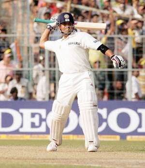 Sachin Tendulkar celebrates after scoring the winning run for India on Day 5 of the second Test against South Africa at Eden Gardens in Kolkata on December 2, 2004