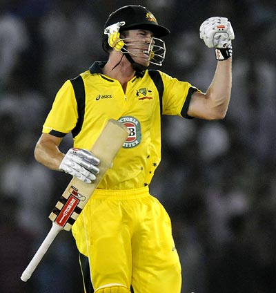 Australia's James Faulkner celebrates after winning the 3rd ODI in Mohali on Saturday