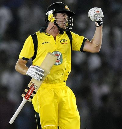 Australia's James Faulkner celebrates after winning the 3rd ODI in Mohali on Saturday