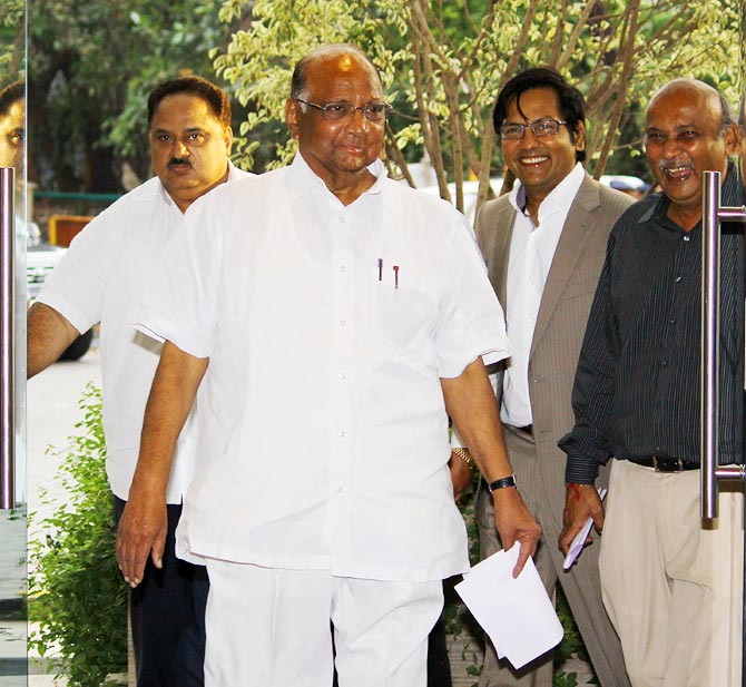 MCA president Sharad Pawar (2nd left) with managing committee member Nadeem Menon (left), vice-president Dr Vijay Patil, (2nd right) and joint secretary Nitin Dalal in Mumbai.