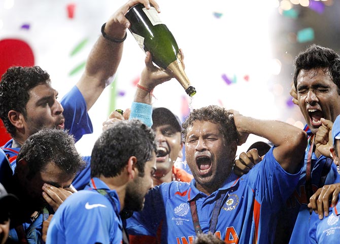 Sachin Tendulkar (centre) celebrates with team mates after winning the 2011 World Cup final against Sri Lanka in Mumbai