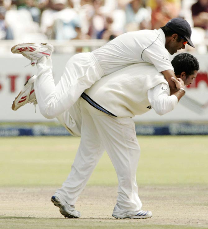 Rahul Dravid celebrates a wicket with Sachin Tendulkar