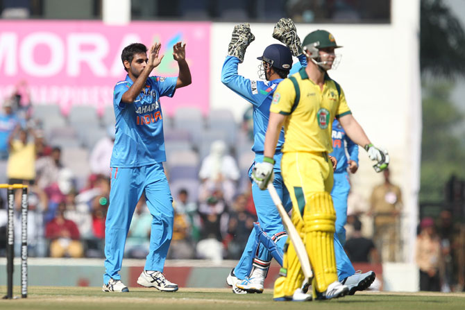 Bhuvneshwar Kumar celebrates wicket of Phillip Hughes 