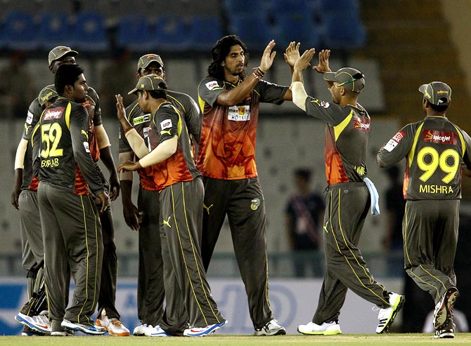 Ishant Sharma (centre) celebrates with team mates after taking the wicket of Upul Tharanga