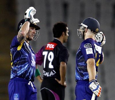 Otago Volts captain Brendon McCullum and Derek de Boorder of Otago Volts celebrate after victory in clinched