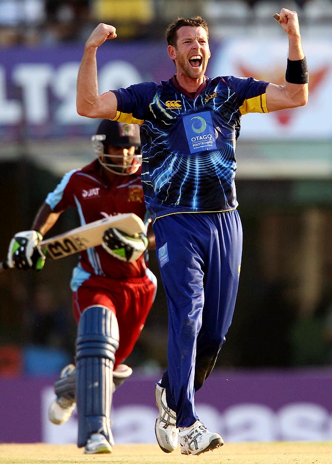 Ian Butler celebrates after getting the wicket of Chamara Silva