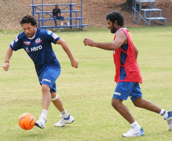 Sachin Tendulkar plays a game of football