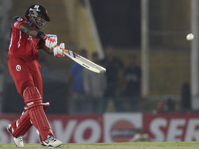 Darren Bravo hits over the top for a boundary