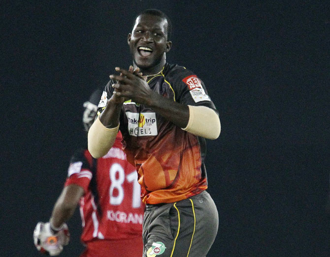 Darren Sammy of Sunrisers Hyderabad celebrates the wicket of Nicholas Pooran of Trinidad & Tobago 