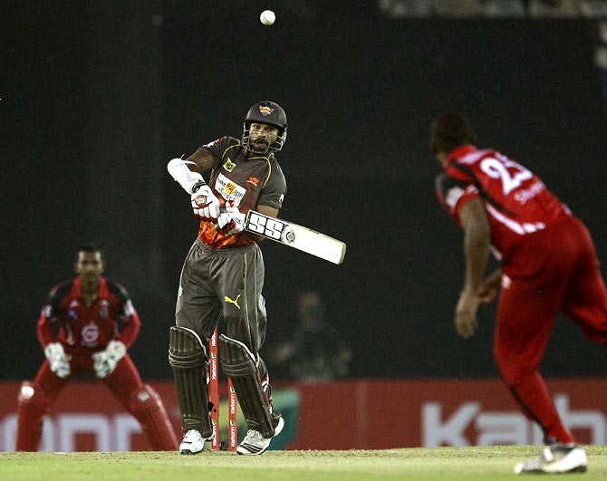 Shikhar Dhawan is caught and bowled by Navin Stewart