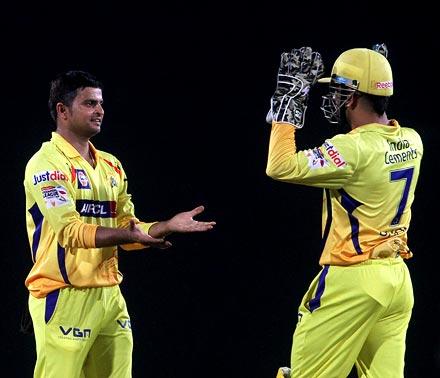 Suresh Raina (left) with Mahendra Singh Dhoni