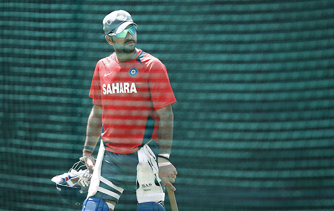 Yuvraj Singh leaves after batting in the nets during a practice session