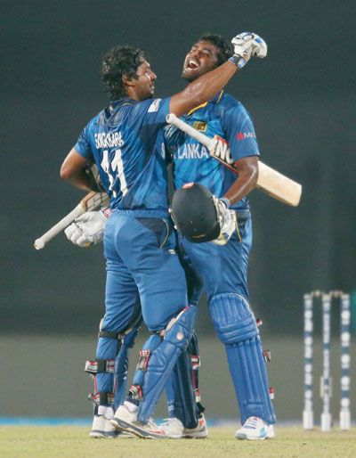 : Kumar Sangakkara and Thisara Perera celebrate as Sri lanka beat India in the final