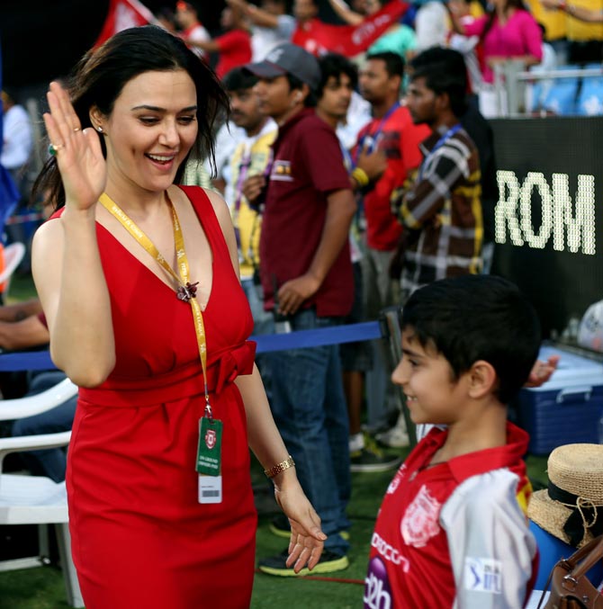 Preity Zinta, co-owner of Kings XI Punjab, with a young fan