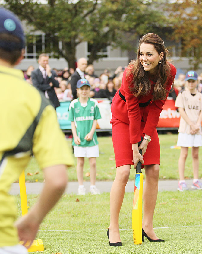 Duchess of Cambridge, Catherine 'Kate' Middleton, takes guard against the bowling of husband and Duke of Cambridge Prince William, during the countdown to the 2015 ICC Cricket World Cup at Latimer Square in Christchurch, New Zealand on Monday