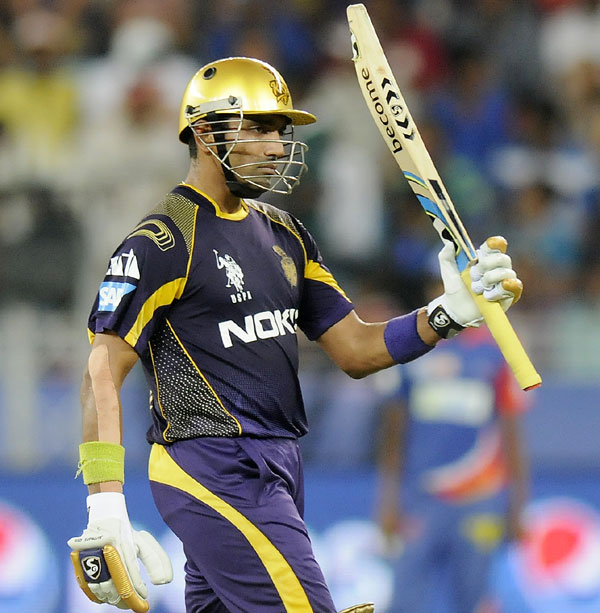 Robin Uthappa acknowledges the cheers after scoring a fifty