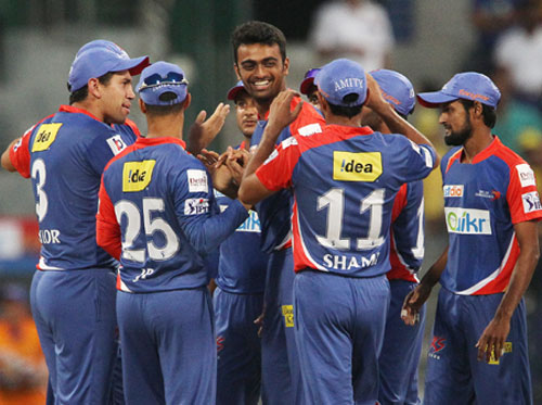 Jaydev Unadkat celebrates a wicket with his Delhi teammates