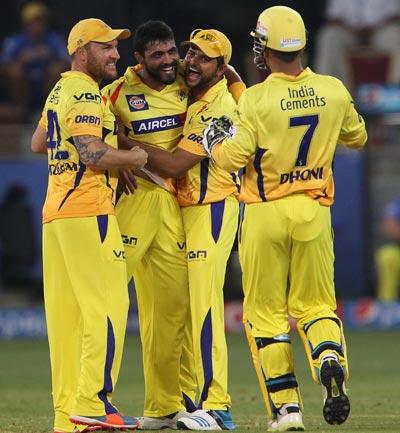 Ravindra Jadeja (centre) is congratulated by Brendon McCullum (left), Suresh Raina (right) and Chennai skipper Mahendra Singh Dhoni.