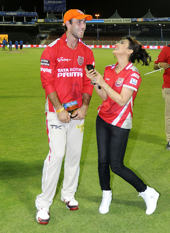 Glenn Maxwell and Preity Zinta share a laugh after the match on Tuesday