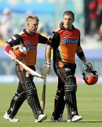 Hyderabad Sunrisers' David Warner and Aaron Finch walk back after their fine partnership against Delhi Daredevils on Friday.