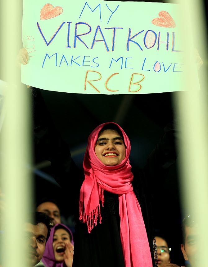 A young female fan with a message for Virat Kohli