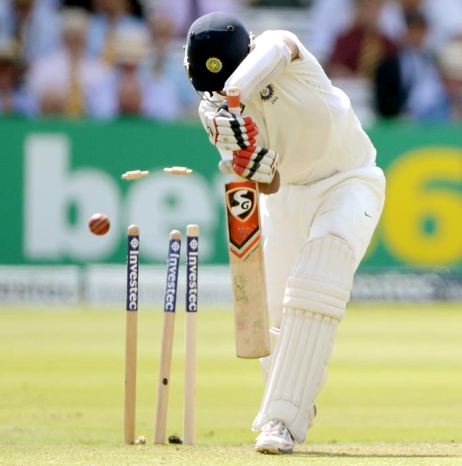 Cheteshwar Pujara of India is bowled by Ben Stokes of England during day one of the second Test match at Lord's