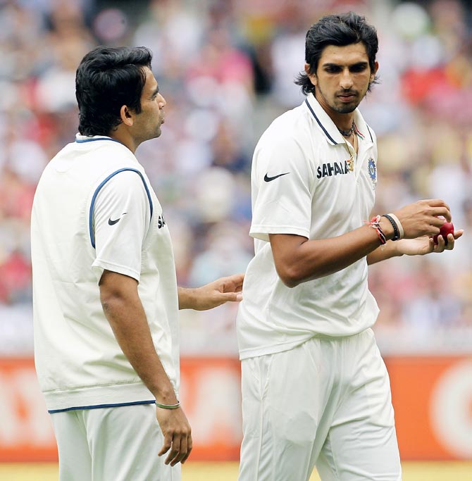 Zaheer Khan, left, advises Ishant Sharma during a Test match