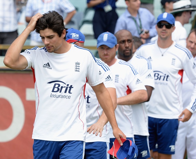 England captain Alastair Cook with teammates