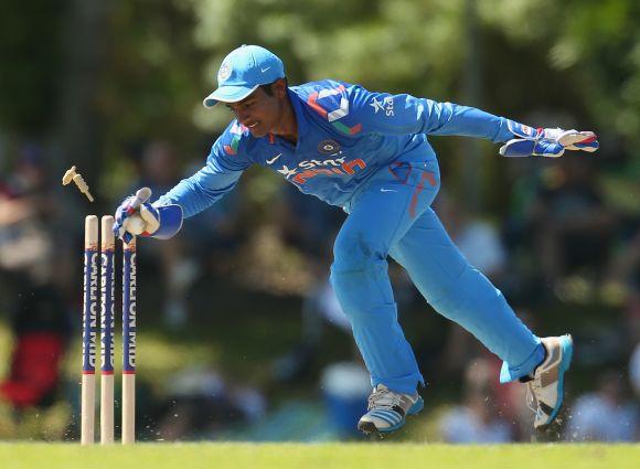 Sanju Samson effects a stumping.