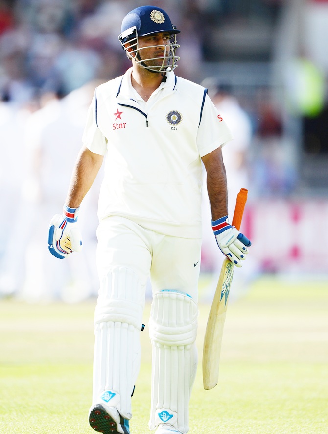 Mahendra Singh Dhoni of India leaves the field after being dismissed by Moeen Ali