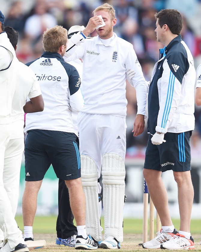 England batsman Stuart Broad receives treatment after being hit by a ball