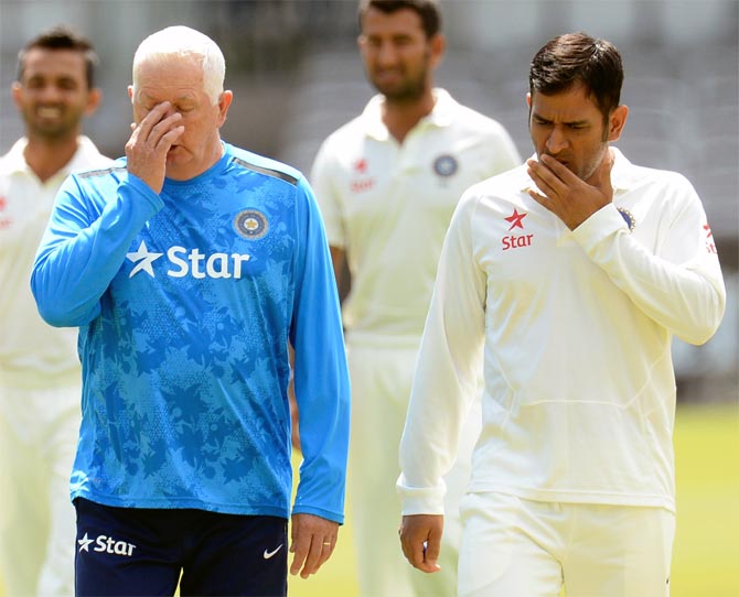 Mahendra Singh Dhoni (right) with coach Duncan Fletcher