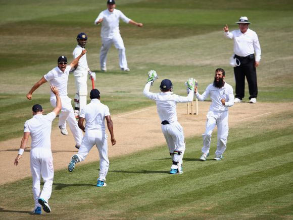 Moeen Ali celebrates a wicket 
