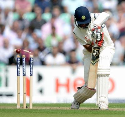 Cheteshwar Pujara is bowled by Stuart Broad