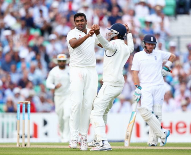 Ravichandran Ashwin celebrates with team-mates after taking the wicket of Gary Balance on Day 2 of the fifth Test at the Kia Oval