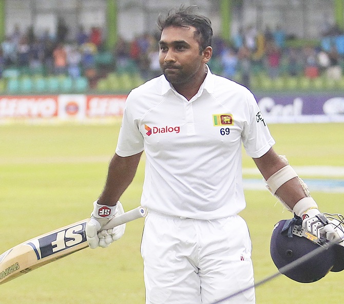 Sri Lanka's Mahela Jayawardene walks off the field after his dismissal during the fourth day of their second and final Test match against Pakistan in Colombo