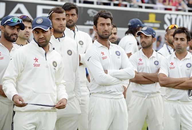 India's players look on during the presentations after   losing the fifth cricket Test match and the series against England at the Oval