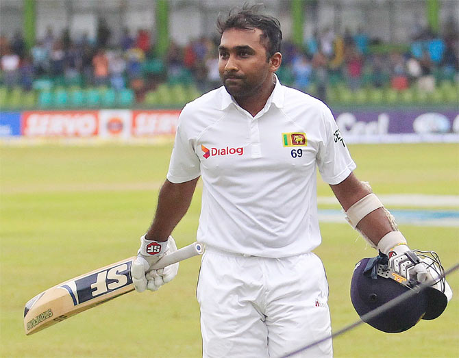 Sri Lanka's Mahela Jaywardene walks off the field after his dismissal during the fourth day of their second and final Test match against Pakistan in Colombo on Sunday