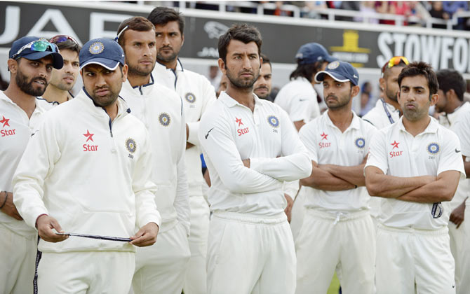 India's players look on during the presentation after losing the fifth cricket Test match and the series against England at the Oval cricket ground in London on Sunday