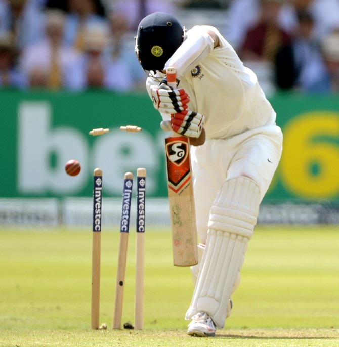 Cheteshwar Pujara is bowled by Ben Stokes of England during the second Test