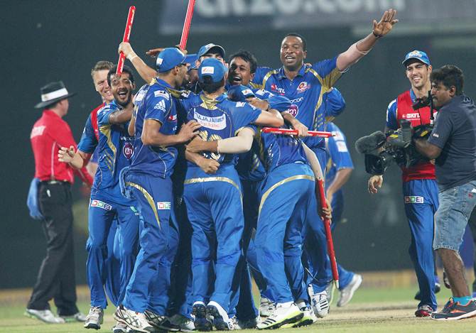 Mumbai Indians players celebrate after beating Rajasthan Royals in the final of the 2013 Champions League T20