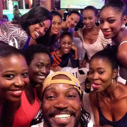 Chris Gayle takes a selfie with a roomful of his admirers
