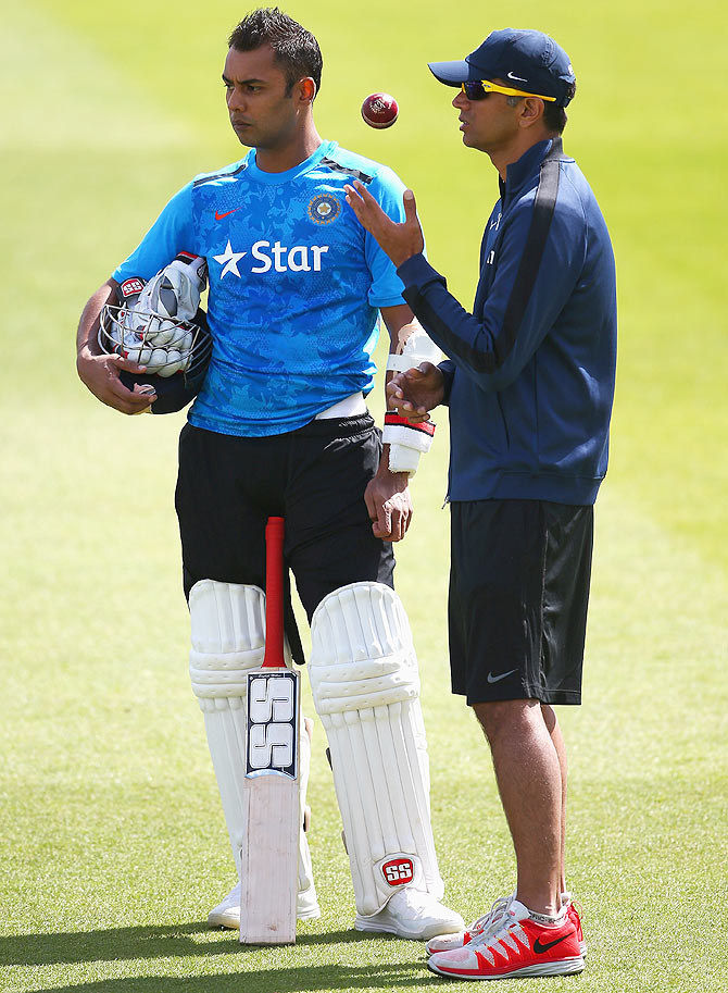 Stuart Binny of India talks to Rahul Dravid during a India nets session