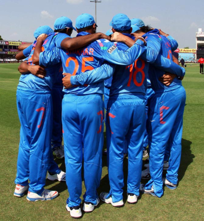 Team India in a huddle