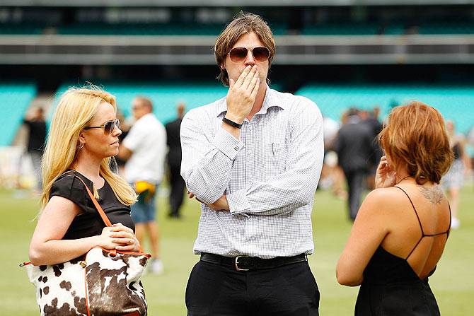 Former Australian cricketer Nathan Bracken awaits the funeral service for Australian cricketer Phillip Hughes at the Sydney Cricket Ground